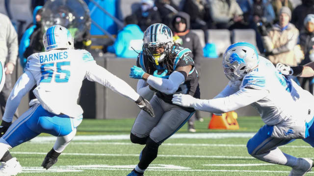 Detroit Lions Derrick Barnes and Alim McNeill miss a tackle against Carolina Panthers.